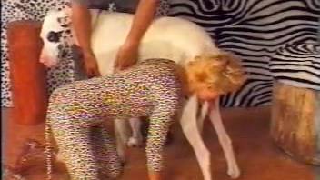 Gorgeous lady with a snug vagina is aggressively pounded by a large spotted dog