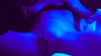 Voluptuous naked woman pleasures herself as the dog licks her vagina