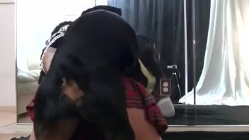 Student girl gets on hands and knees to be banged by a canine